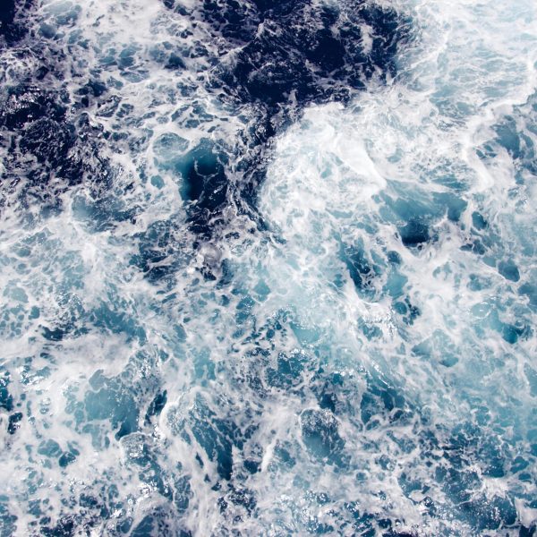 pexels-photo-812958-812958-2 A dramatic view of swirling ocean waves captured from above, showcasing the beauty of maritime motion.